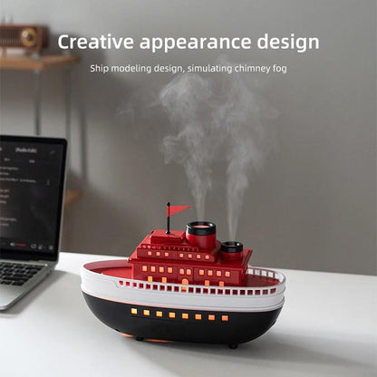 Boat-shaped electric aroma diffuser releasing cool bakhoor mist in a modern UAE living room