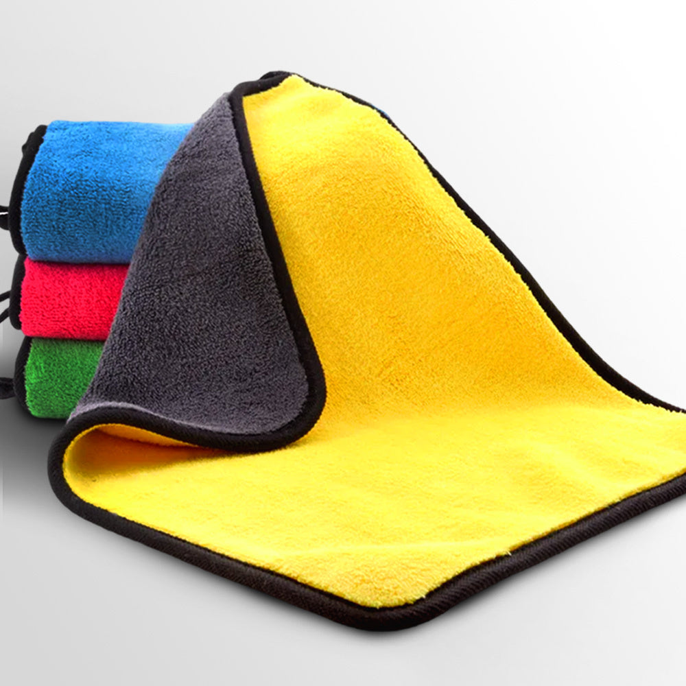 Microfiber cloth polishing a car surface without scratching the paint