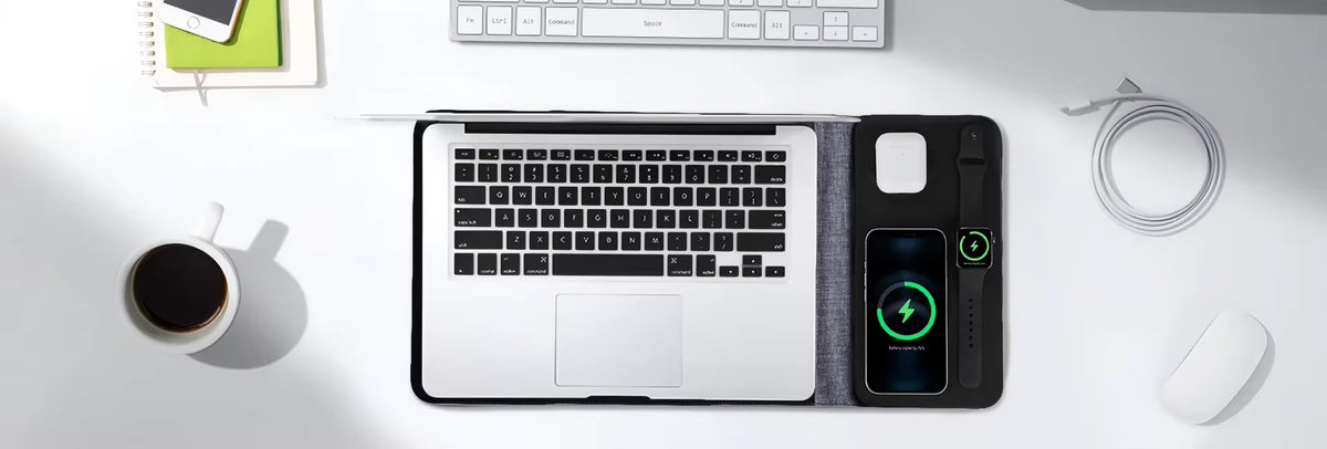 4-in-1 laptop sleeve used as a desk mat and wireless charging pad in a modern work-from-home setup with laptop and mouse