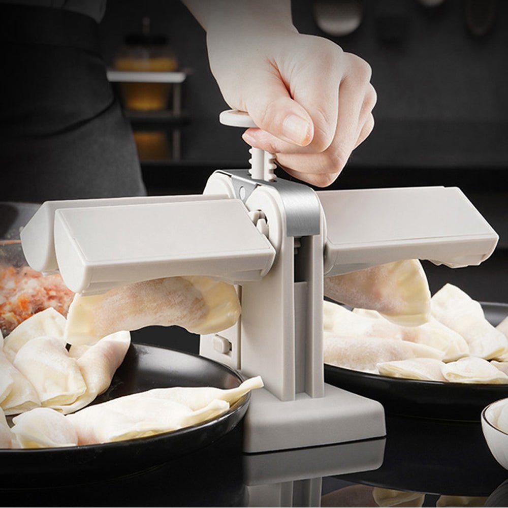Dumpling press making two sealed dumplings at once