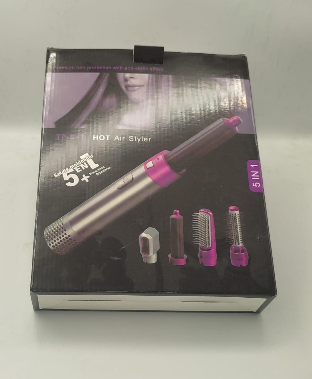 Dry, style and volumise hair in one step with ionic hot air brush
