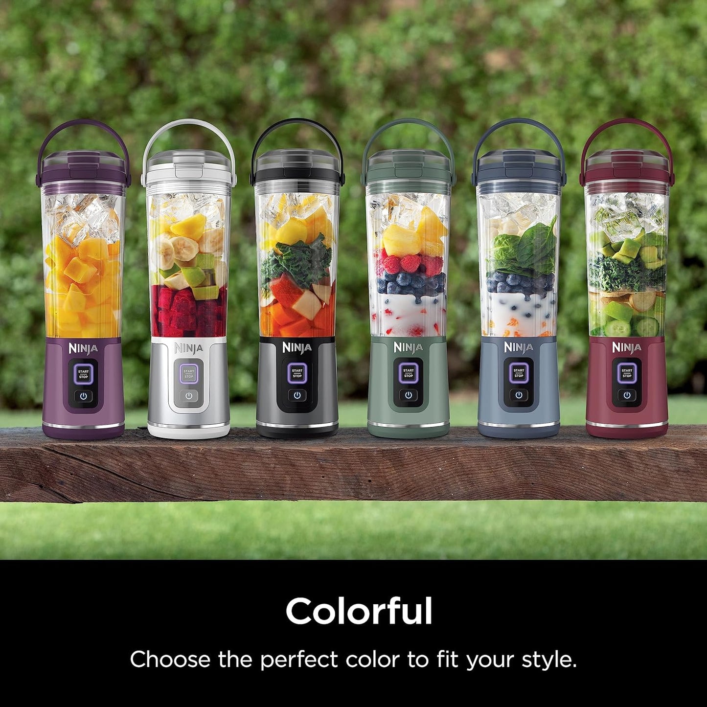 Cordless portable blender making a fresh fruit smoothie in a travel cup